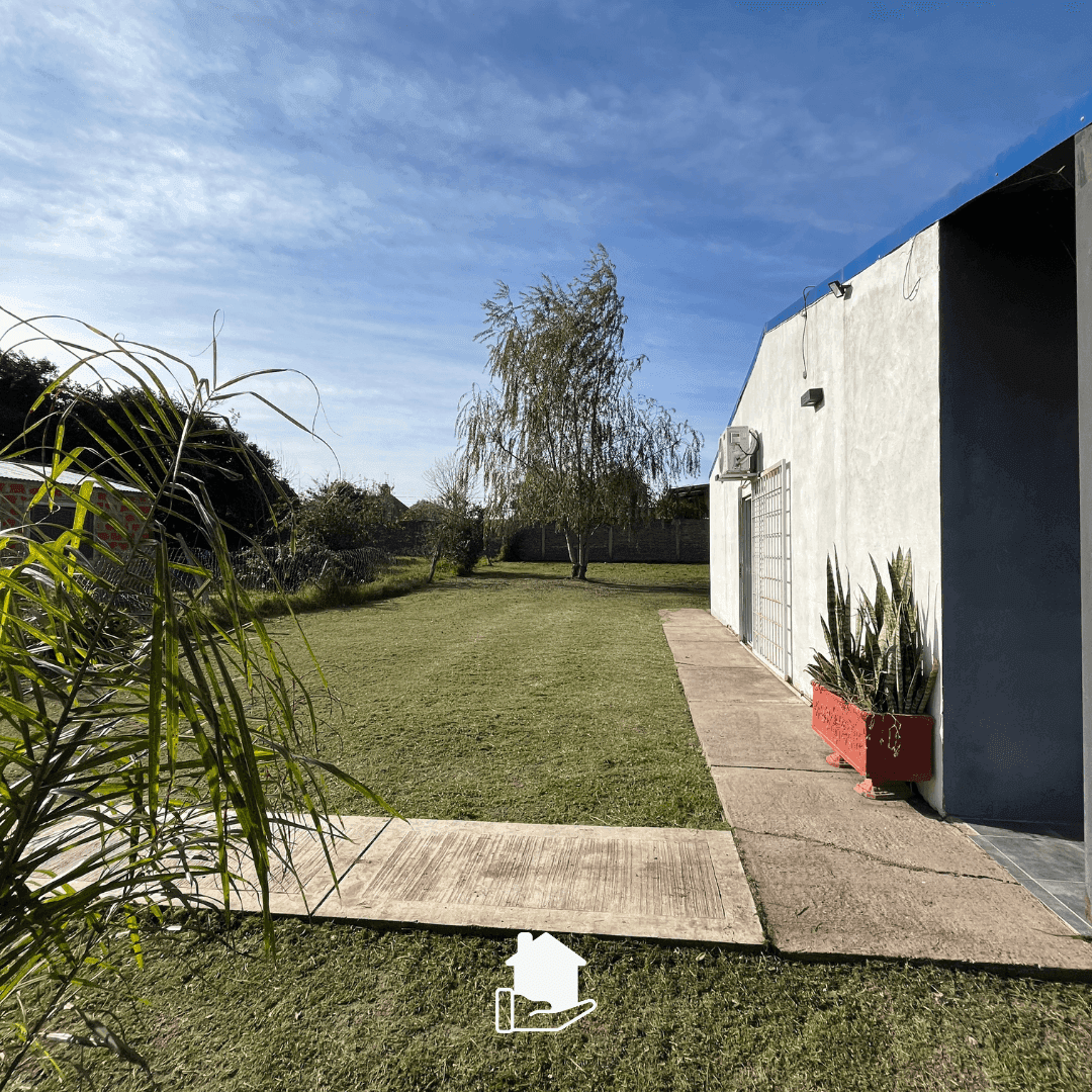 Imagen de la propiedad CASA CON AMPLIO PATIO VERDE 