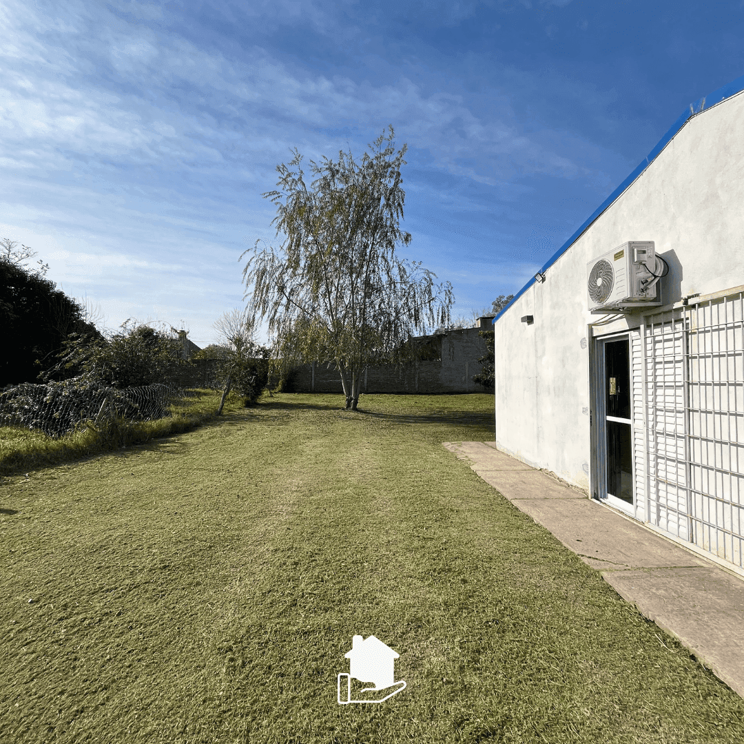 Imagen de la propiedad CASA CON AMPLIO PATIO VERDE 